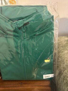 Masters Green Golf jacket with Yellow Emblem -